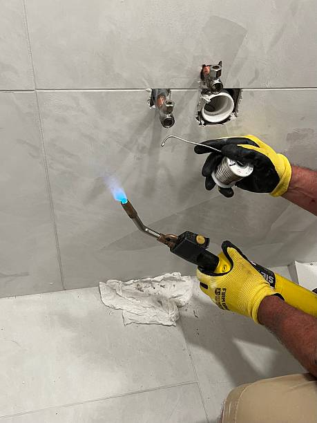 buildfix repairs llc applying solder during the installation of new fixtures